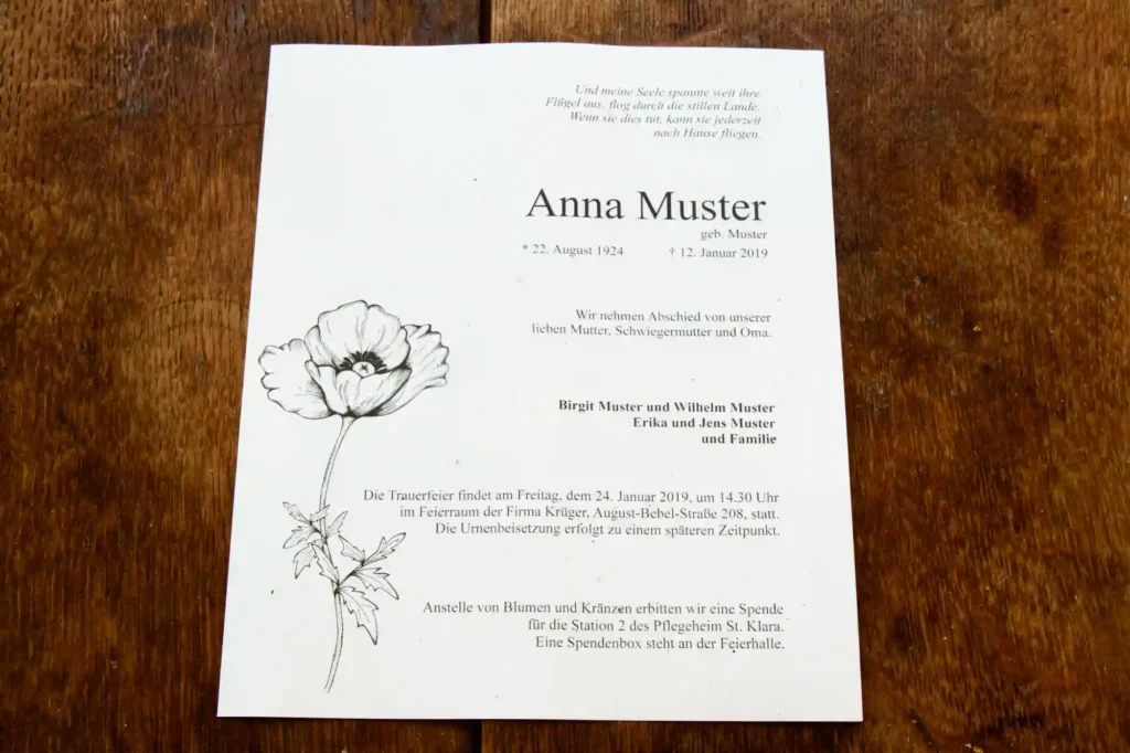 Trauerkarte mit Blume und nostalgischem Text.
